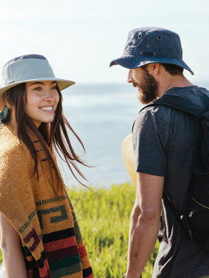 woman and man in hats