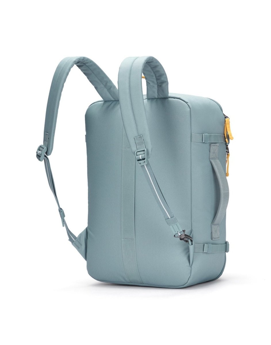 Pacsafe® GO 34L light blue anti-theft carry-on backpack with yellow zippers, shown from the back.