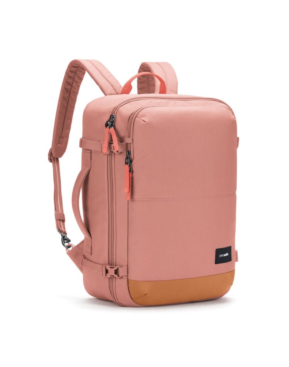 The Pacsafe® GO 34L pink carry-on backpack features padded straps, brown base, and anti-theft zippers.