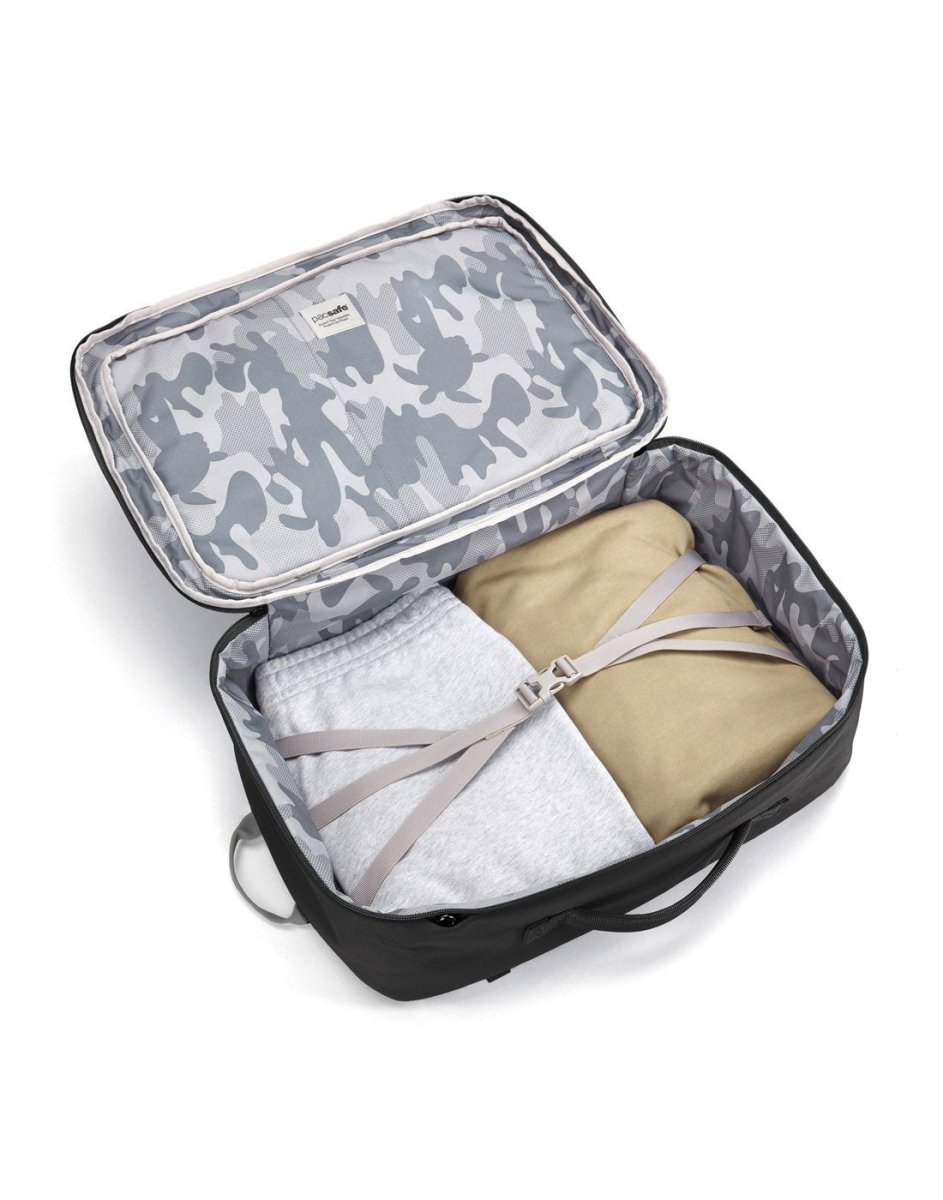 Pacsafe® GO 34L Anti-theft Carry-on Backpack features recycled lining, strap-secured clothes, and lockable main compartment.