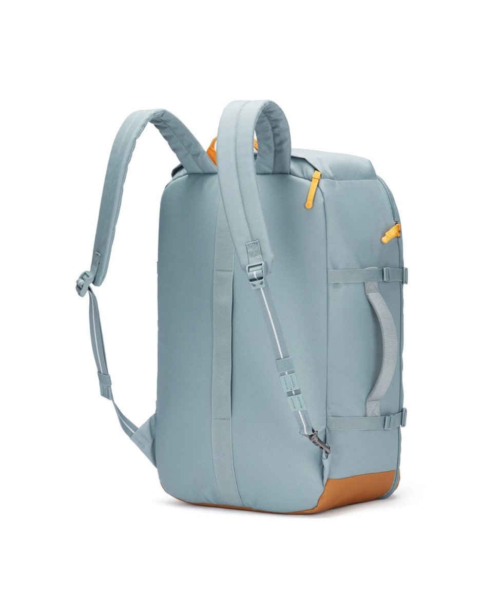 Pacsafe® GO 44L Anti-theft Carry-on Backpack in light blue with padded straps, tan base, and RFID pocket.