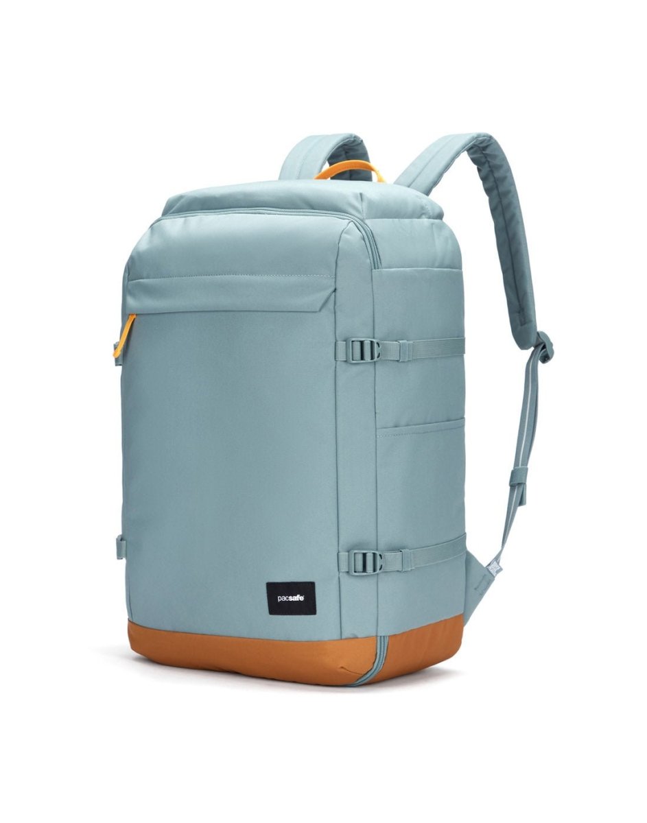 Pacsafe® GO 44L light blue anti-theft carry-on backpack with padded straps, RFID pocket, and brown base.