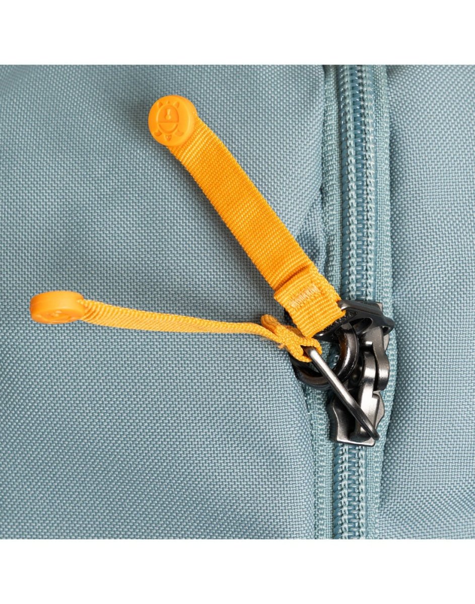 Close-up of Pacsafe® GO 44L Carry-on Backpack zipper with two yellow pulls, perfect for travel.