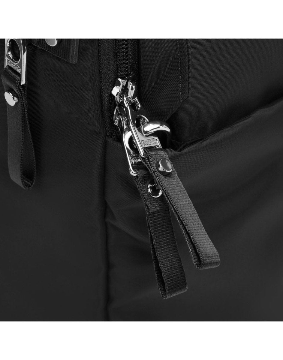 Close-up of black zipper pulls on silver zippers of Pacsafe® W 10L Anti-theft Backpack.