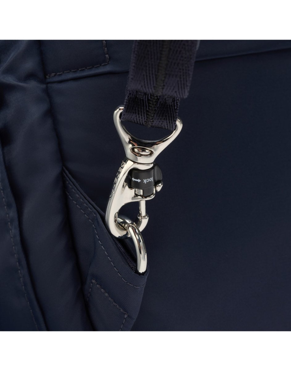 Close-up of the metal clasp on a Pacsafe® W 10L Anti-theft Backpack, highlighting stitching and texture details.