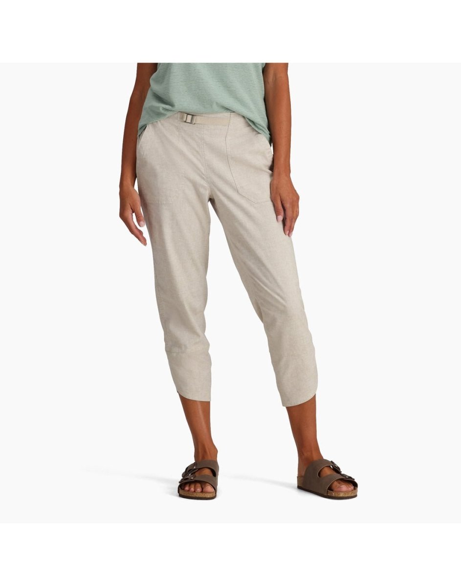 Person in light green top, Royal Robbins Hempline Capri, and brown sandals against a plain background.