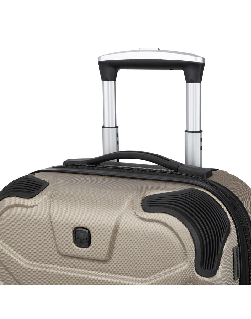Close up of top grab handle and telescopic handle extended on Swiss Gear Fortress 19" Hardside Carry-on Spinner in sand colour