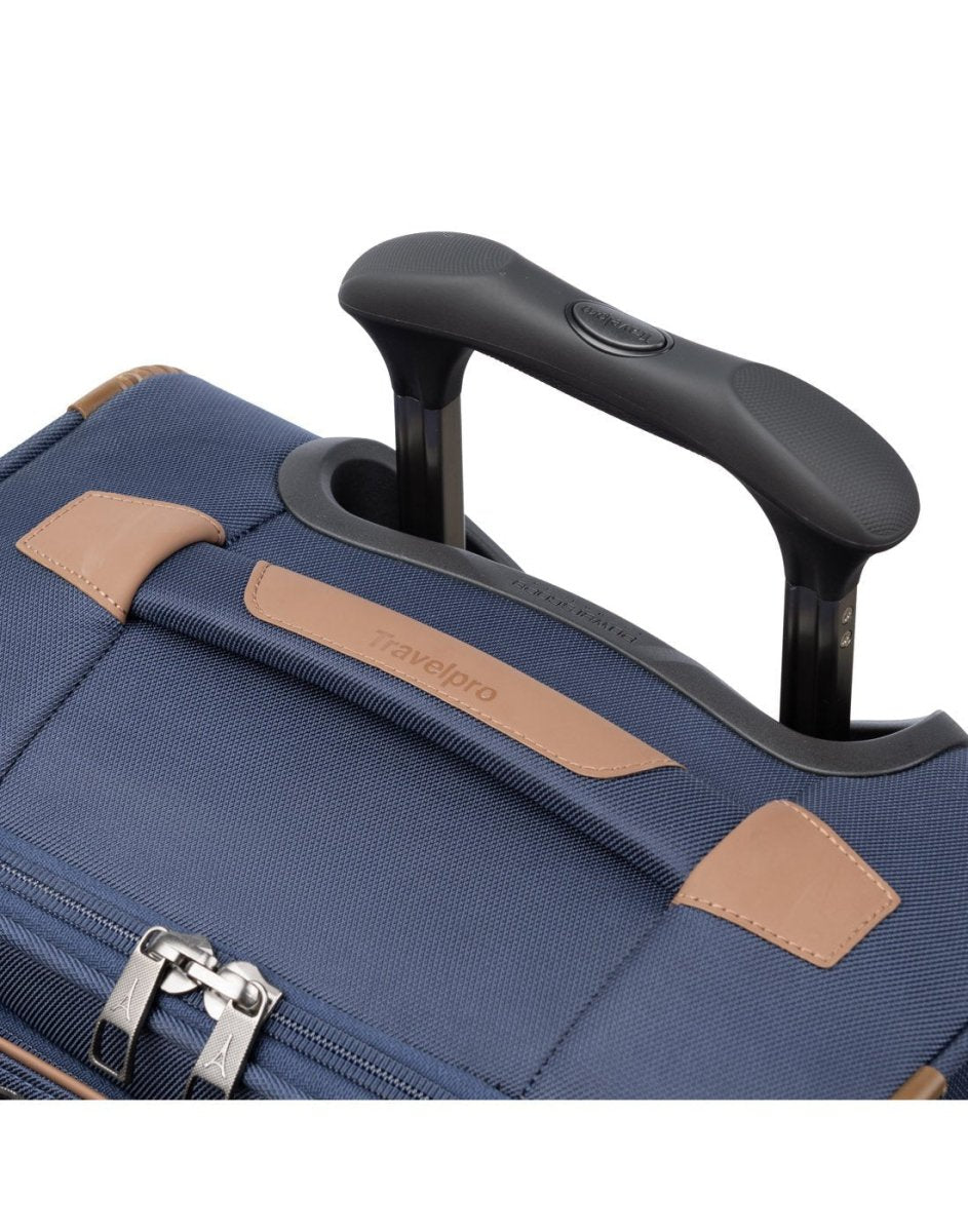 Close up of telescopic handle partially extended on the Travelpro Crew™ Classic Carry-on Expandable Spinner in Patriot Blue.