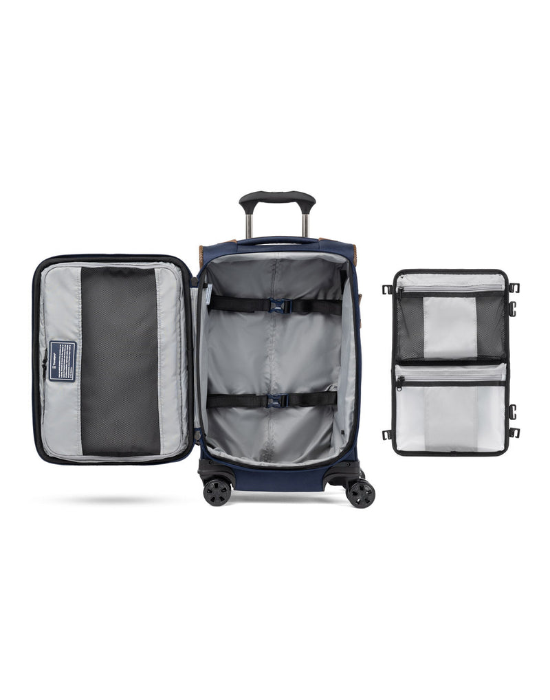 Travelpro Crew™ Classic Carry-on Expandable Spinner in Patriot Blue, interior view and the removable compression packing organizer.