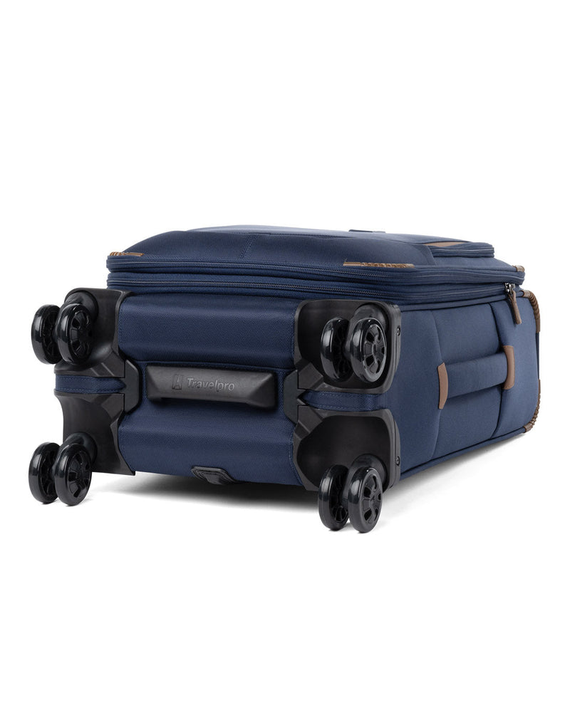 Travelpro Crew™ Classic Compact Carry-on Expandable Spinner in patriot blue, bottom view of wheels