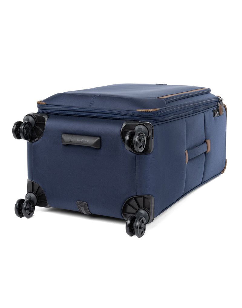Travelpro Crew™ Classic Large Check-in Expandable Spinner in Patriot Blue, bottom view. Showing the eight ultra-durable, 360° MagnaTrac® self-aligning spinner wheels.