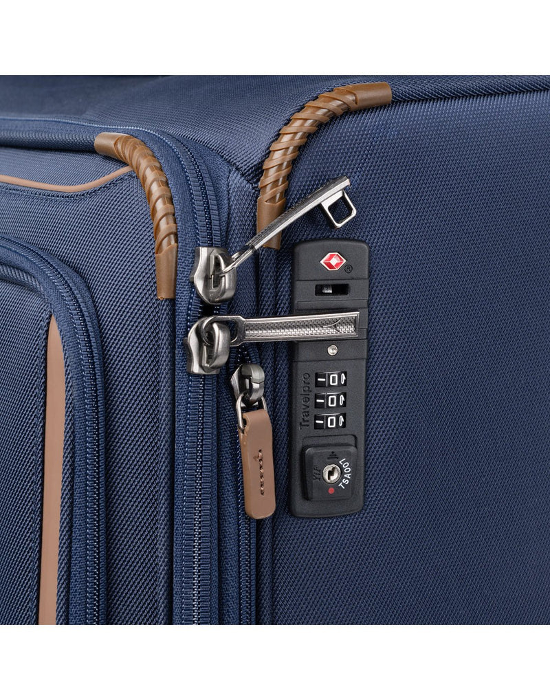 Travelpro Crew™ Classic Large Check-in Expandable Spinner in Patriot Blue. Close-up view of the TSA-approved zipper lock.