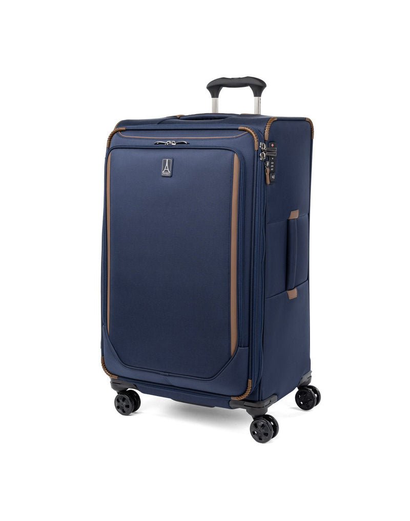 Travelpro Crew™ Classic Large Check-in Expandable Spinner in Patriot Blue, front and partial left-side view.