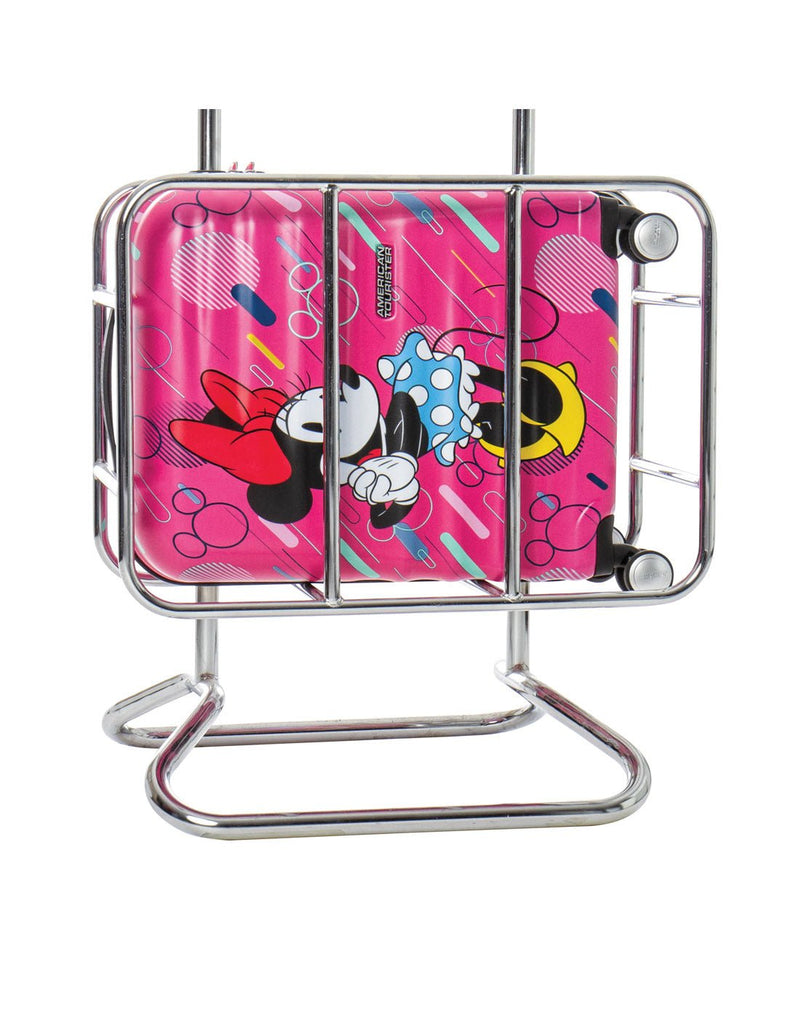 American Tourister Disney Wavebreaker Spinner Carry-on - Minnie Future Pop in an airline size cradle