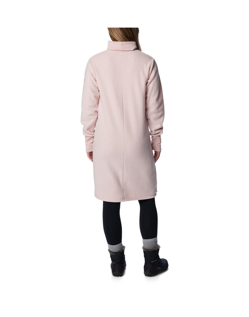 Back view of a woman wearing a Columbia Women's Boundless Trek™ Fleece Dress in Dusty Pink.