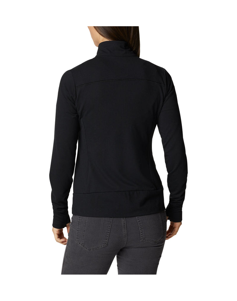 Woman wearing black jeans and Columbia Women's Weekend Adventure™ Full Zip Jacket in black, zipped up, back view