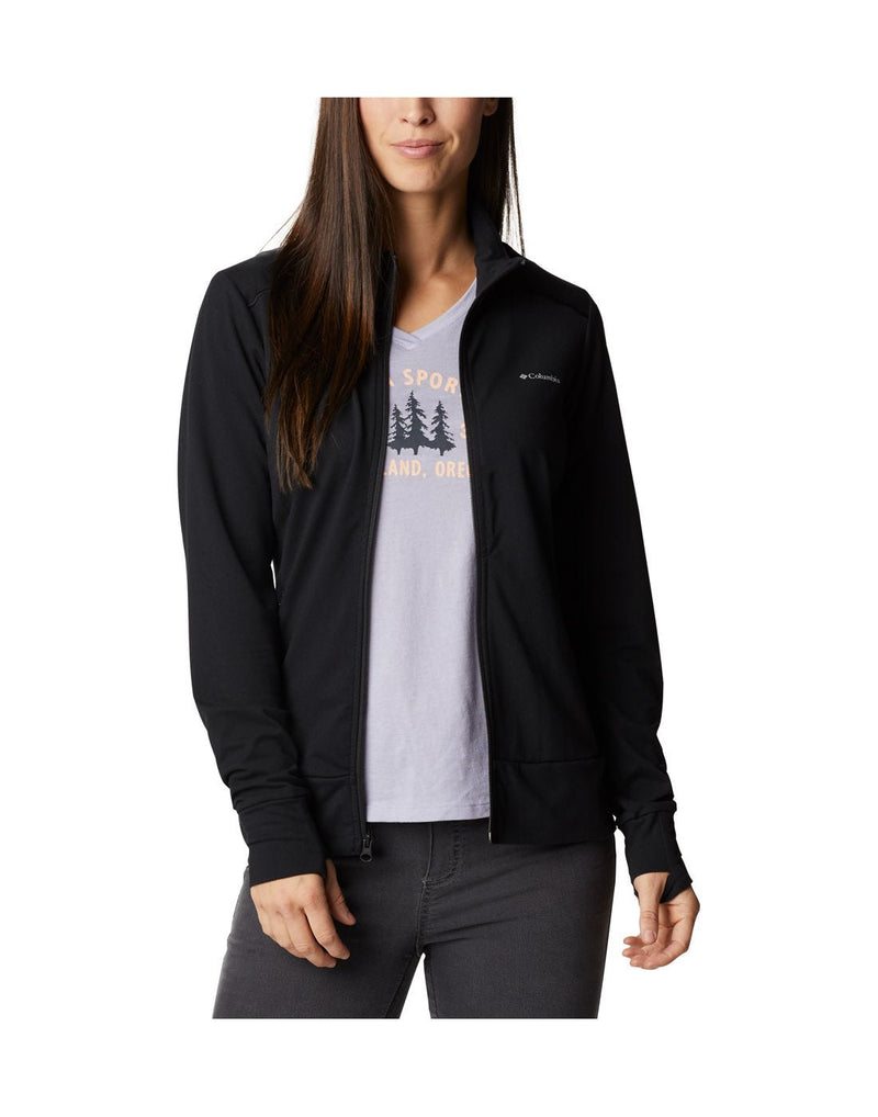 Woman wearing black jeans, light blue t-shirt and Columbia Women's Weekend Adventure™ Full Zip Jacket in black, unzipped, front view