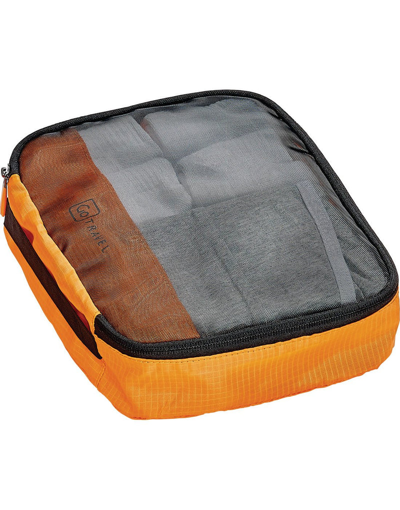 Medium size packing cube packed with clothes and zipped up