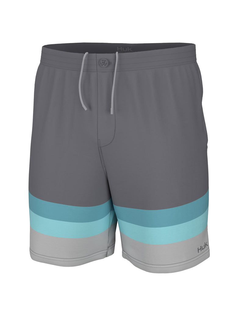 Huk Men's Pursuit Boardshort in Bowline Night Owl grey with blue, turquoise and light grey stripes at the bottom of each leg, front view