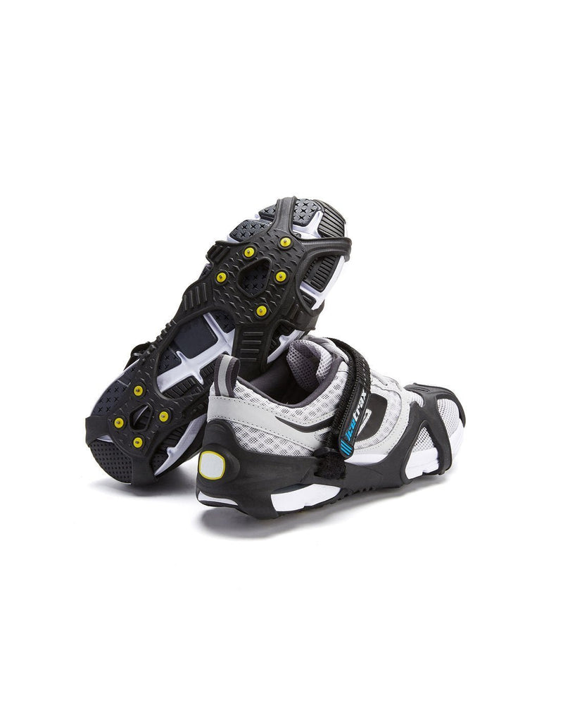 Icetrax V3 tungsten ice cleats with velcro straps on white shoes