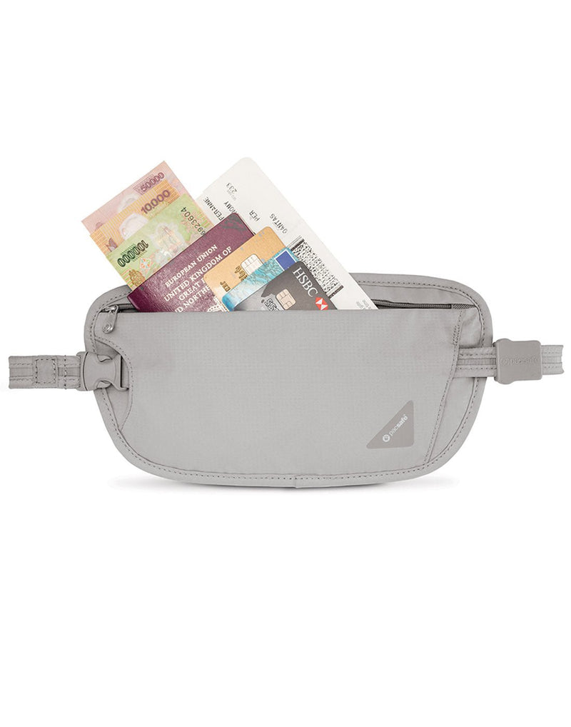 Pacsafe Coversafe® X100 RFID Blocking Security Waist Wallet in grey, unzipped with passport, cash and credit cards sticking out