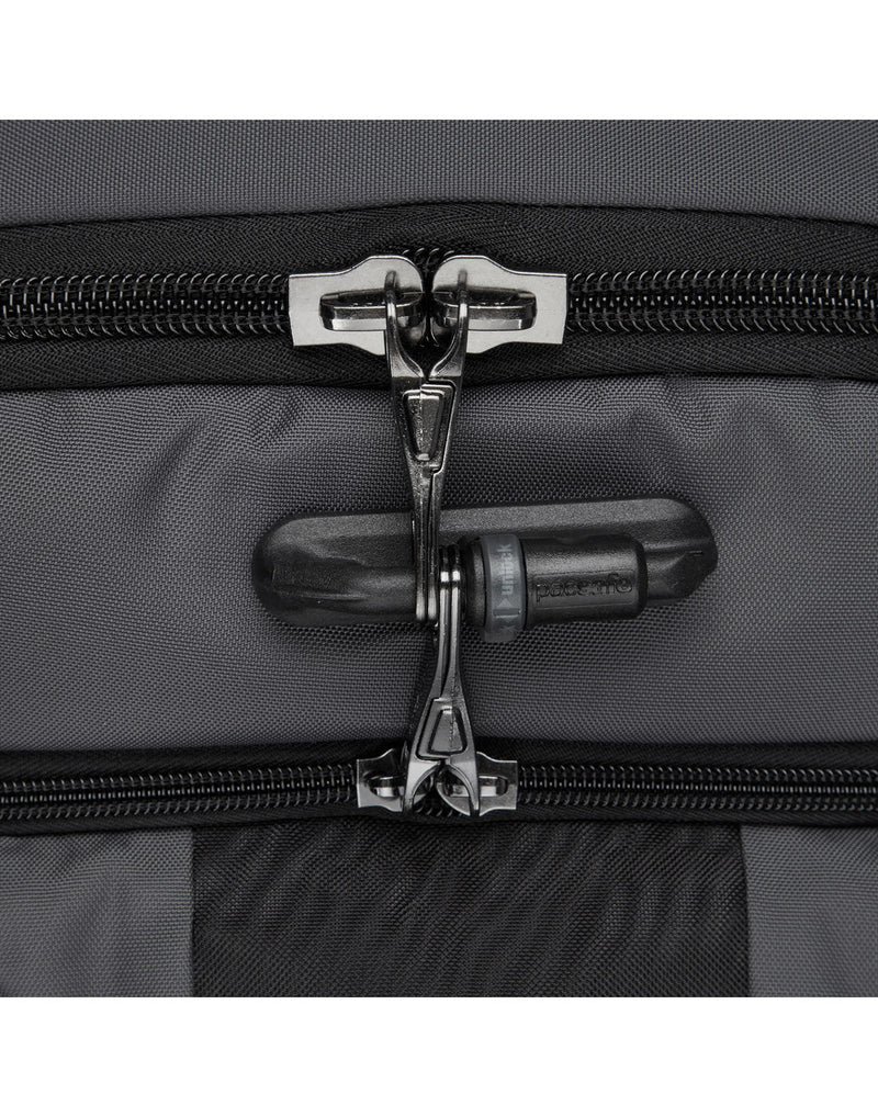 Clos up of lockable zipper pulls on slate bag