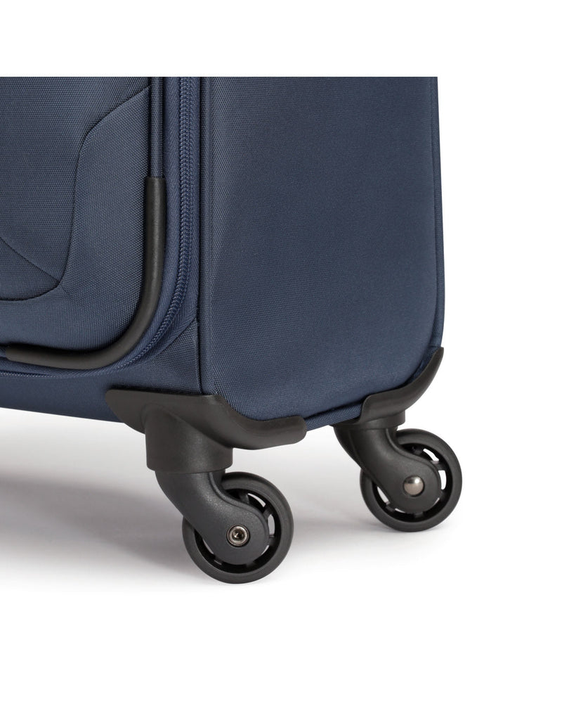Close up of black spinner wheels on blue Swiss Gear Round Trip II 19" Carry-on Spinner