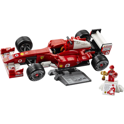 LEGO® Ferrari F2004 & Michael Schumacher set features a red F1 car, driver minifigure, and plaque. ONLINE ONLY.