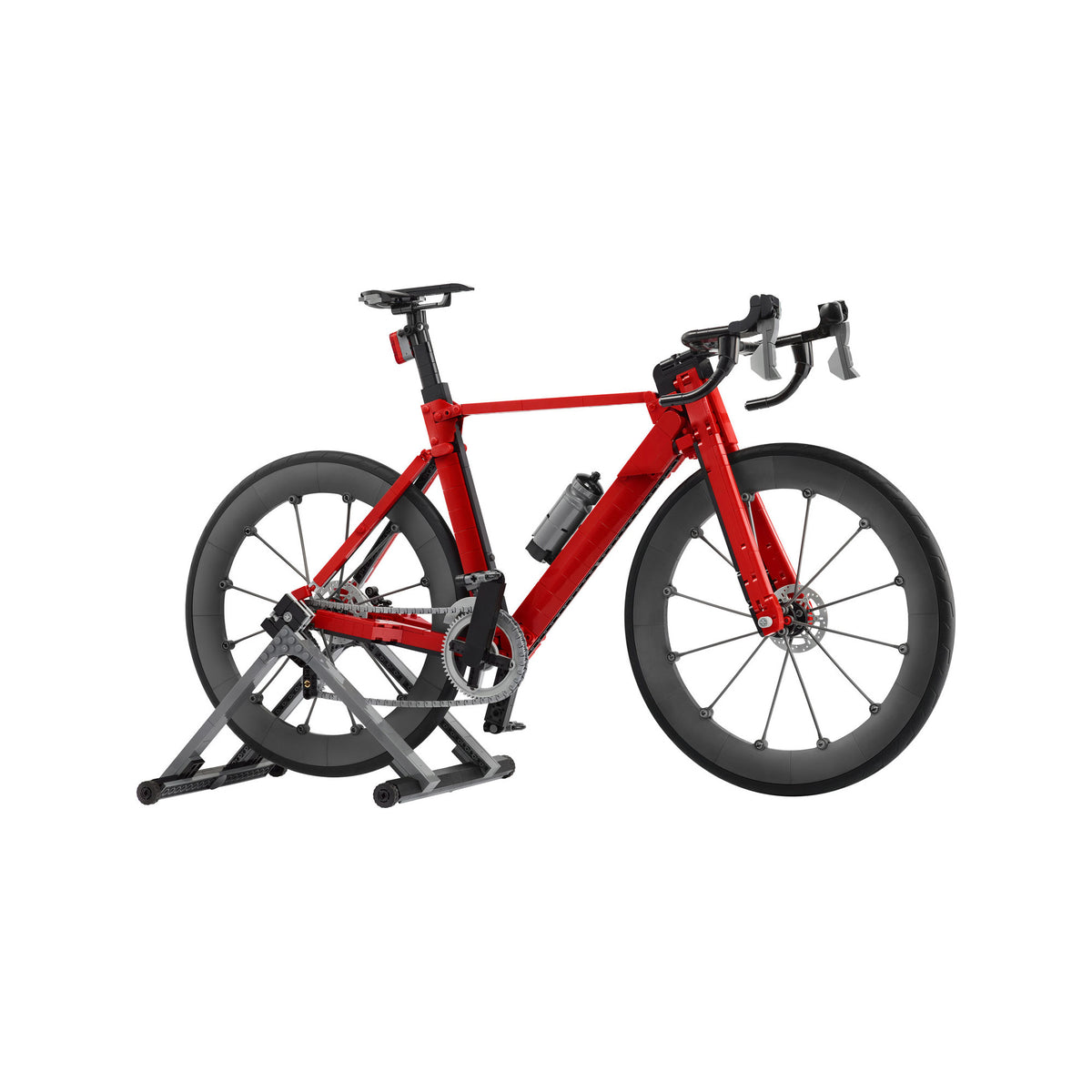 LEGO® Road Bike - ONLINE ONLY: Red LEGO cycling replica on black trainer, with frame-mounted water bottle.