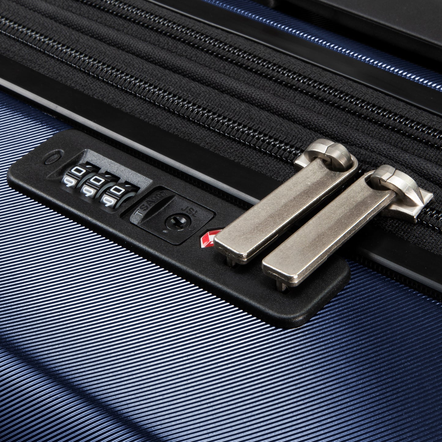 Close-up of Ricardo Beverly Hills Melrose 20" Hardside Spinner Carry-on with a built-in combination lock.