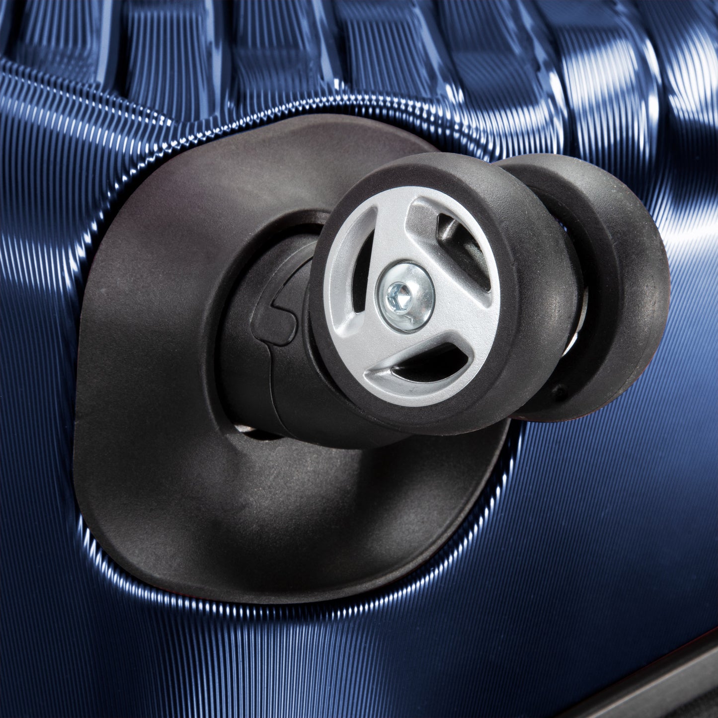 Close-up of a wheel on the Ricardo Beverly Hills Melrose 25" Hardside Spinner with blue textured finish.