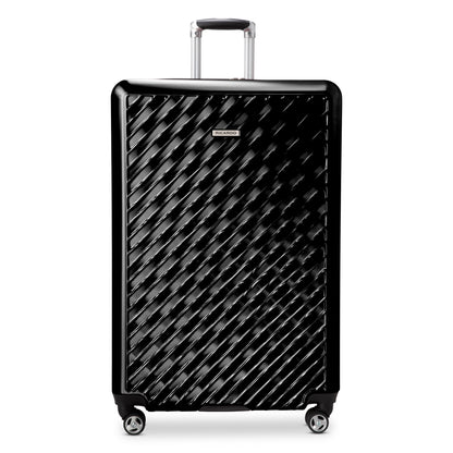Ricardo Beverly Hills Melrose 29" hardside spinner, black with textured diagonal pattern, shown upright.