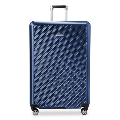 Ricardo Beverly Hills Melrose 29" large blue hardside spinner luggage with four wheels and telescopic handle.