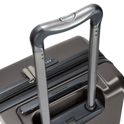 Close-up of Ricardo Beverly Hills Montecito 2.0 gray carry-on handle with TSA lock and zipper closure.