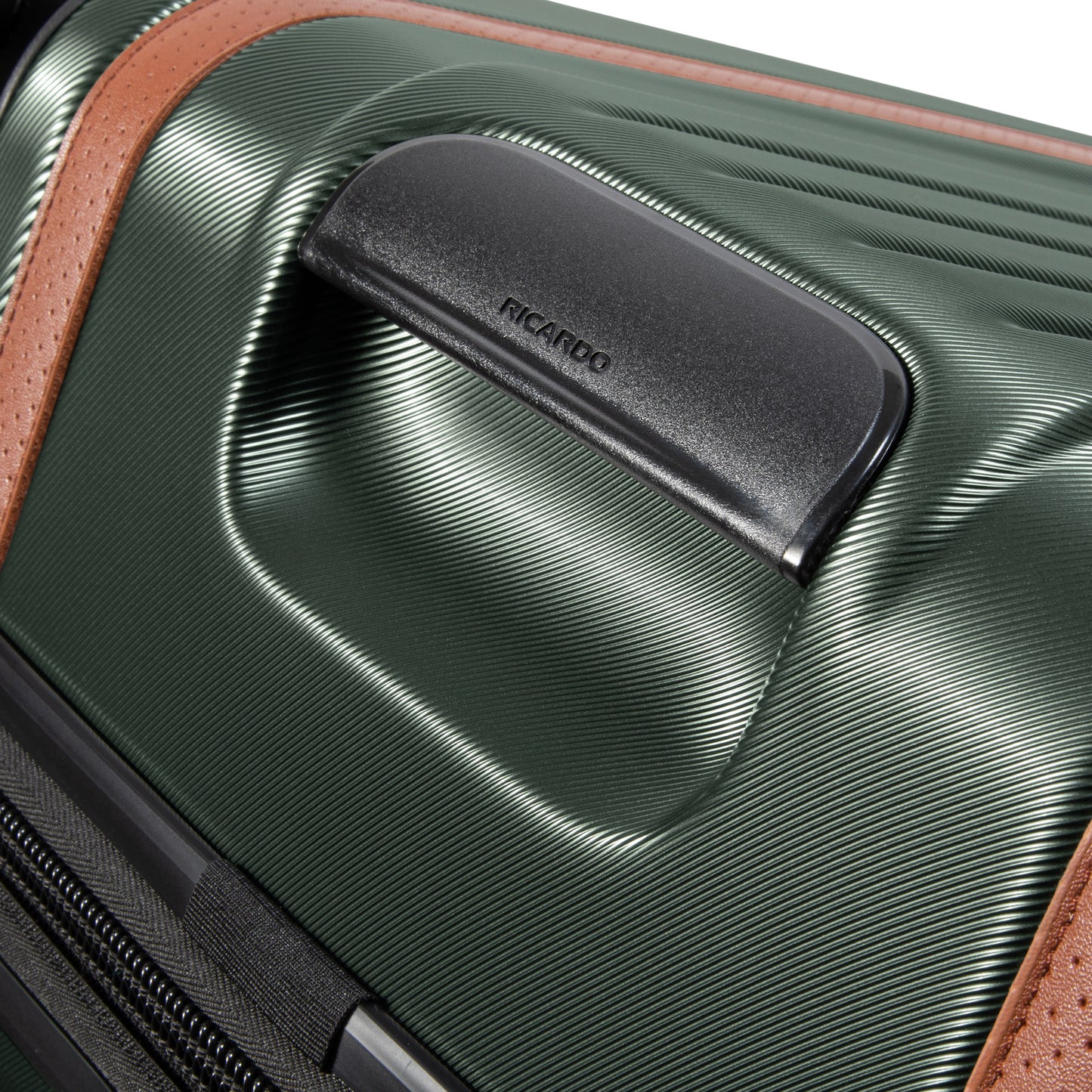 Close-up of Ricardo Beverly Hills Montecito 2.0 green carry-on with black handle, TSA lock, and brown accents.