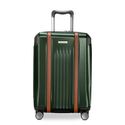 Ricardo Beverly Hills Montecito 2.0 21" green hardside carry-on with TSA lock, brown accents, spinner wheels; ideal for travel.