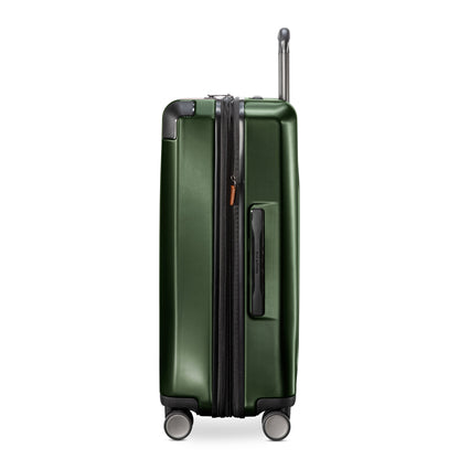 Ricardo Beverly Hills Montecito 2.0 25" green spinner with expandable storage and TSA lock, side view.