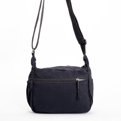 The Miss Caprice Multi-zip Small Hobo Crossbody features front zip pocket and adjustable strap, ideal for travel.
