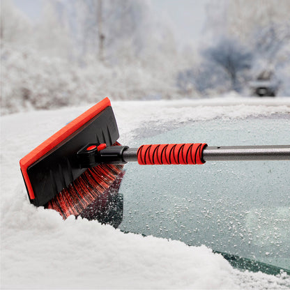 The SubZero® MAXX-Force™ 60-inch Snowbroom clears snow from a car window for easy windshield removal.