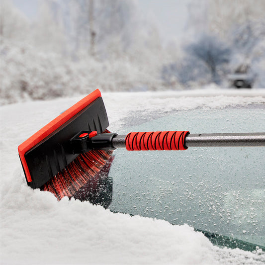 Product Image – The SubZero® MAXX-Force™ 60-inch Snowbroom clears snow from a car window for easy windshield removal.