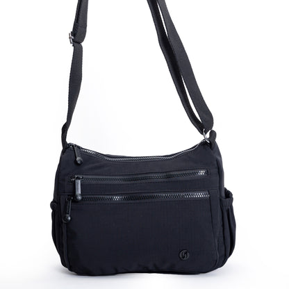 Miss Caprice Multi-zip Crossbody: stylish bag with adjustable strap, zip pockets & side compartments.