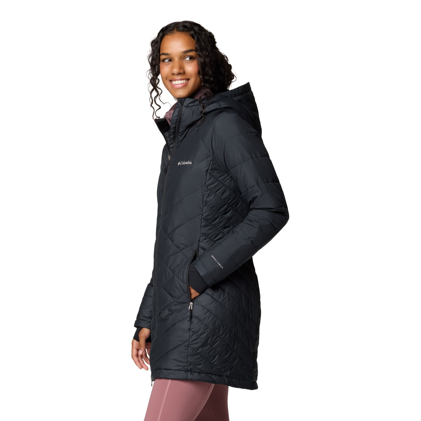 Woman wearing Columbia Women's Heavenly™ Long Hooded Jacket in black, side view