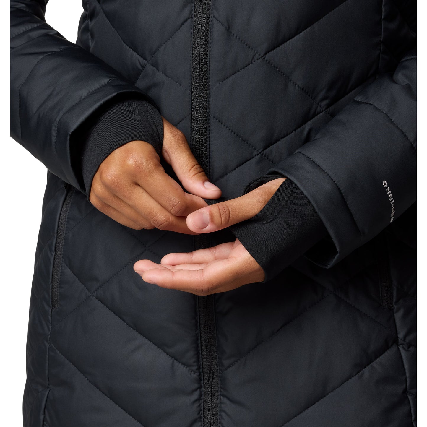 Close up of thumb holes on sleeve cuffs of black Top half of woman wearing Columbia Women's Heavenly™ Long Hooded Jacket