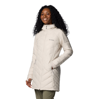 Woman wearing Columbia Women's Heavenly™ Long Hooded Jacket in dark stone, white colour, zipped up and one hand in pocket