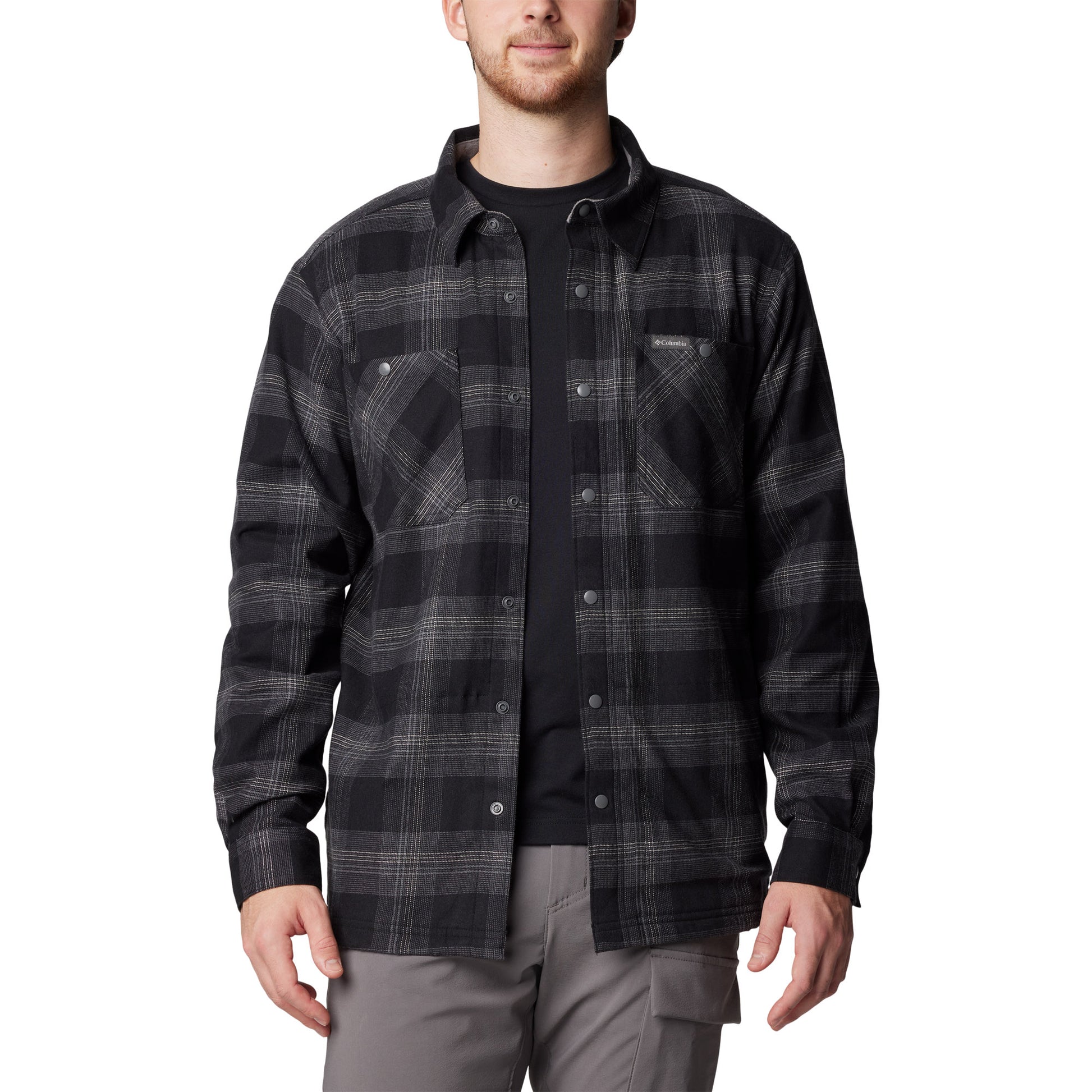 Man wearing Columbia Men's Cornell Woods™ Fleece Lined Shirt Jacket in black buffalo tartan, unbuttoned, front view