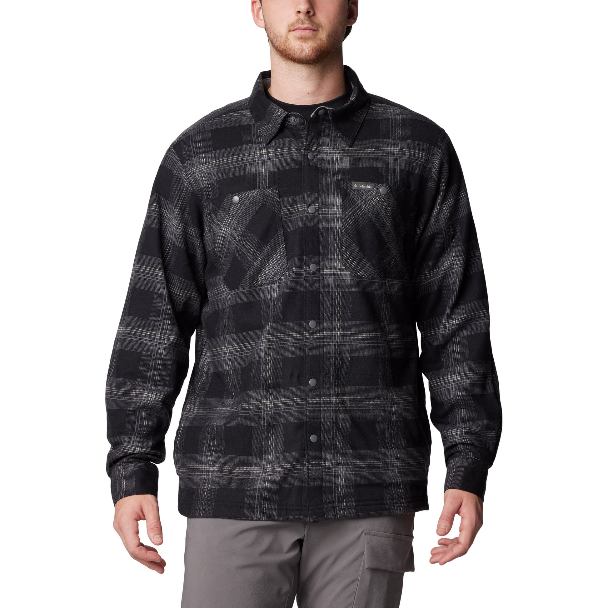 Man wearing Columbia Men's Cornell Woods™ Fleece Lined Shirt Jacket in black buffalo tartan, buttoned up