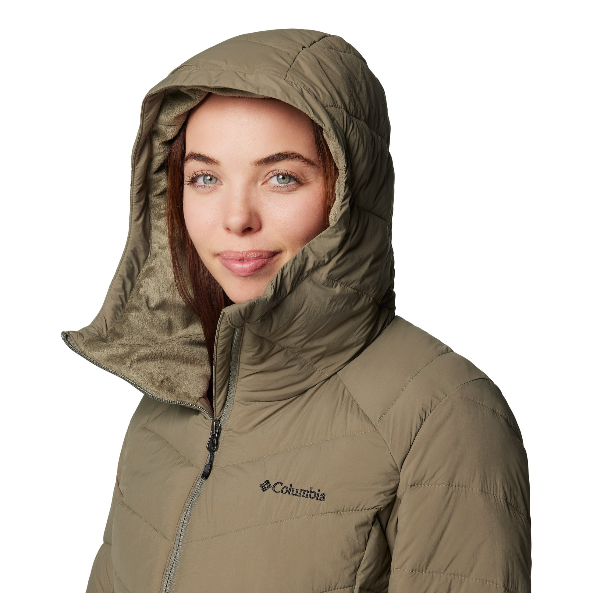 Top half of woman wearing Columbia Women's Joy Peak™ II Mid Hooded Jacket in stone green, with hood up