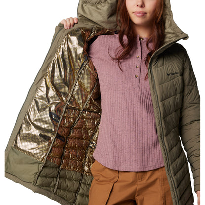 Woman wearing Columbia Women's Joy Peak™ II Mid Hooded Jacket in stone green, unzipped, holding one side open to show omni-heat lining