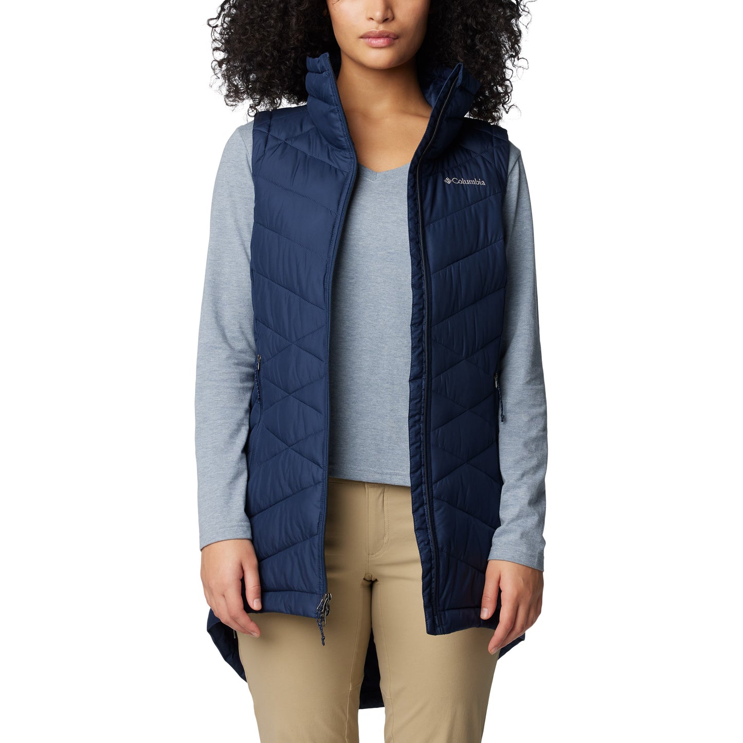 Woman wearing Columbia Women's Heavenly™ II Long Vest in collegiate navy, front view, unzipped