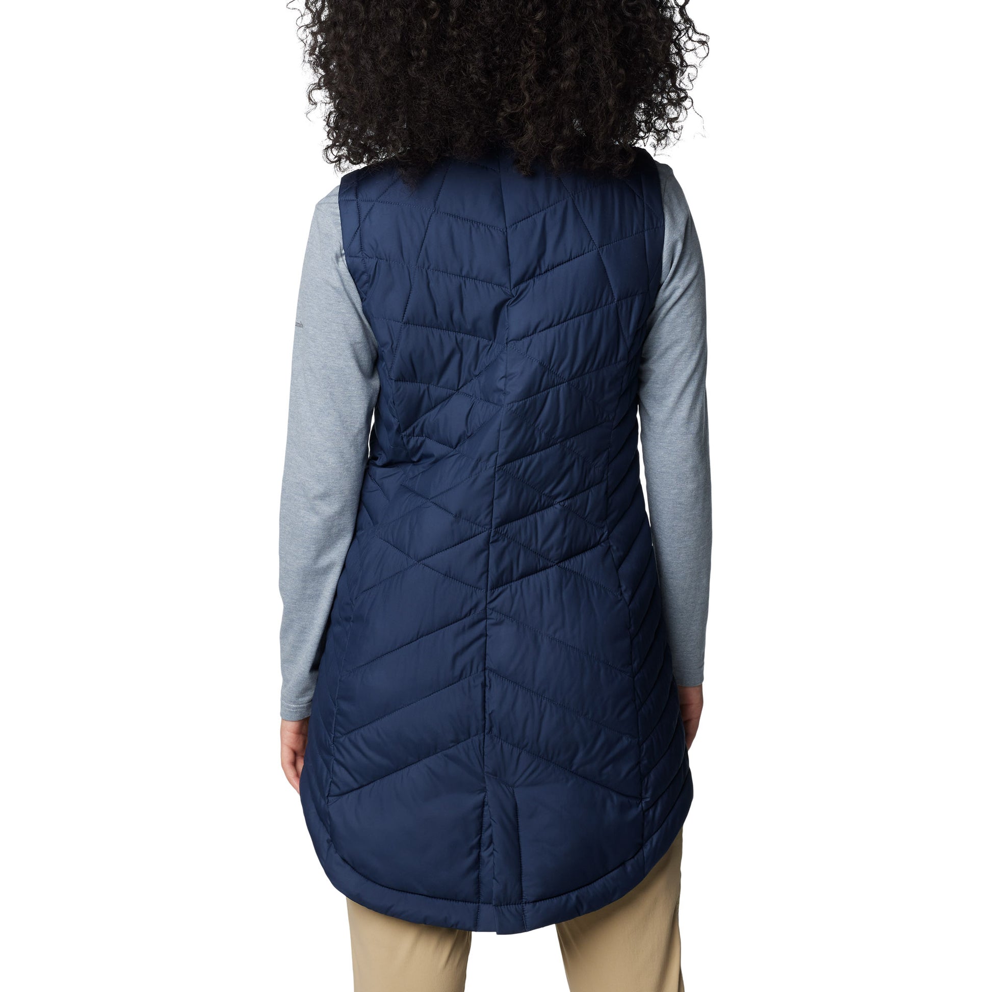 Woman wearing Columbia Women's Heavenly™ II Long Vest in collegiate navy, back view